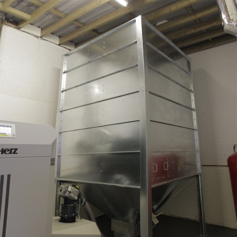 Galvanised steel wood pellet storage silo for domestic and commercial heating systems in Carlisle.