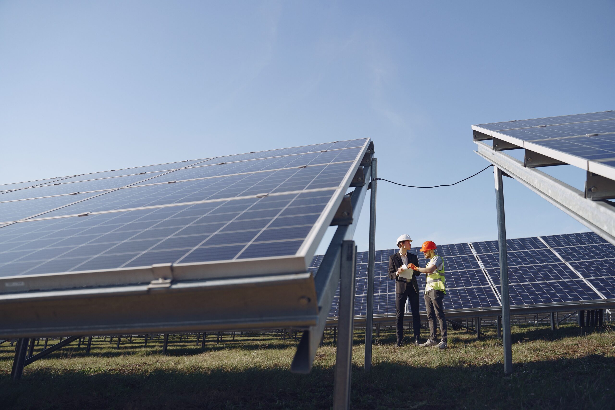 Engineer inspecting solar thermal heating system components